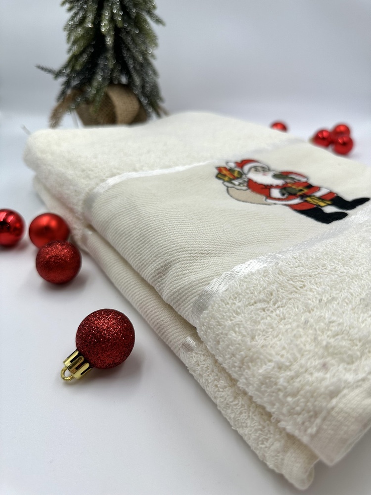 Подарочный новогодний набор банных полотенец Санта махра F0409 фото